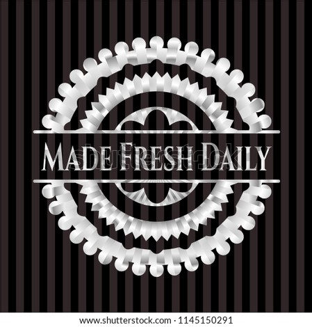Made Fresh Daily silver emblem or badge
