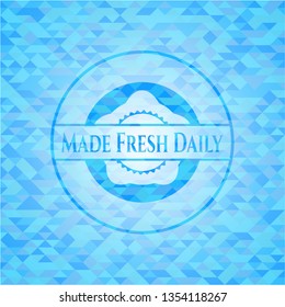 Made Fresh Daily sky blue emblem with mosaic background