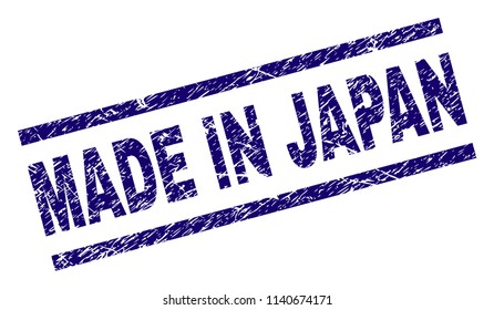 MADE IN JAPAN stamp seal watermark with scratced style. Blue vector rubber print of MADE IN JAPAN caption with dirty texture. Text caption is placed between parallel lines.