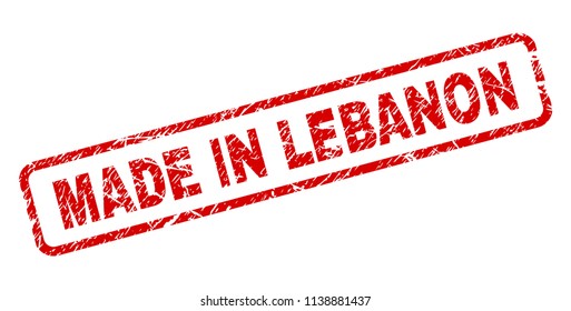 MADE IN LEBANON stamp seal imprint with scratced style. Red vector rubber print of MADE IN LEBANON caption with grunge texture. Text caption is placed inside rounded rectangle frame.