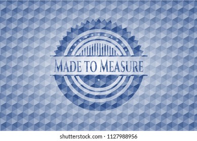 Made to Measure blue emblem or badge with geometric pattern background.