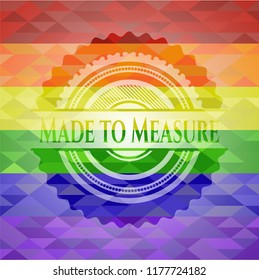 Made to Measure emblem on mosaic background with the colors of the LGBT flag