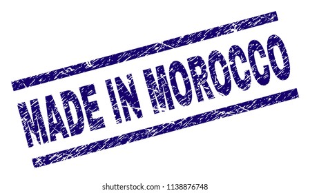 MADE IN MOROCCO stamp seal watermark with grunge style. Blue vector rubber print of MADE IN MOROCCO caption with grunge texture. Text caption is placed between parallel lines.