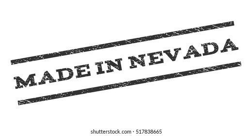 Made In Nevada watermark stamp. Text caption between parallel lines with grunge design style. Rubber seal stamp with dust texture. Vector gray color ink imprint on a white background.