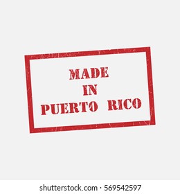 made in Puerto Rico text rubber seal stamp watermark. Caption inside rounded rectangular banner with grunge design and dirty texture. Slanted vector ink sticker on paper background.