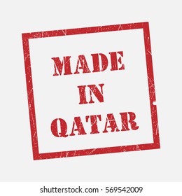 made in Qatar text rubber seal stamp watermark. Caption inside rounded rectangular banner with grunge design and dirty texture. Slanted vector ink sticker on paper background.