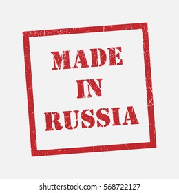 made in Russia text rubber seal stamp watermark. Caption inside rounded rectangular banner with grunge design and dirty texture. Slanted vector ink sticker on paper background.
