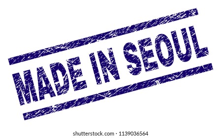 MADE IN SEOUL stamp seal watermark with distress style. Blue vector rubber print of MADE IN SEOUL label with grunge texture. Text label is placed between parallel lines.