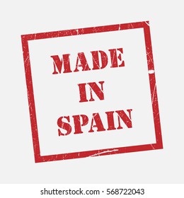 made in Spain text rubber seal stamp watermark. Caption inside rounded rectangular banner with grunge design and dirty texture. Slanted vector ink sticker on paper background.