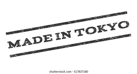 Made In Tokyo watermark stamp. Text caption between parallel lines with grunge design style. Rubber seal stamp with dust texture. Vector gray color ink imprint on a white background.