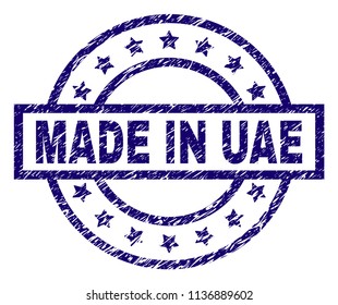 MADE IN UAE stamp seal watermark with grunge texture. Designed with rectangle, circles and stars. Blue vector rubber print of MADE IN UAE caption with grunge texture.