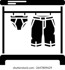 Made in UK Laundry day bliss shorts and underwear on clothes rack vector icon solid style. Suitable for household products, laundry services, clothing brands.