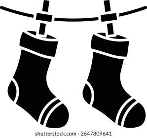 Made in UK Laundry day delight Two socks drying on a clothesline vector icon solid style. Perfect for laundry services, household products, sustainable living, and cleaning advertisements.