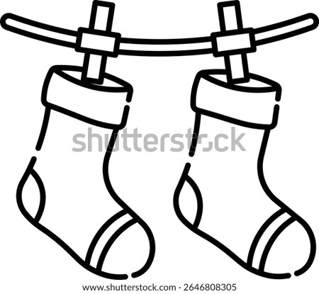 Made in UK Laundry day delight Two socks drying on a clothesline vector icon outline style. Perfect for laundry services, household products, sustainable living, and cleaning advertisements.