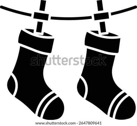 Made in UK Laundry day delight Two socks drying on a clothesline vector icon solid style. Perfect for laundry services, household products, sustainable living, and cleaning advertisements.