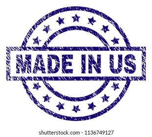 MADE IN US stamp seal watermark with grunge style. Designed with rectangle, circles and stars. Blue vector rubber print of MADE IN US tag with grunge texture.