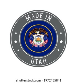 Made in Utah icon. Gray stamp with a round state flag.