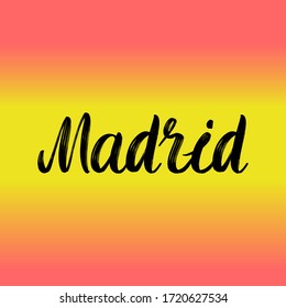 Madrid brush paint hand drawn lettering on background with flag. Capital city of Spain design templates for greeting cards, overlays, posters