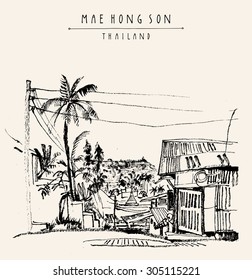 Mae Hong Son, Thailand, Southeast Asia. Traditional Northern Thai wooden house, palm trees, electric wires. Black and white vector postcard, banner or poster with "Maehongson,Thailand" hand lettering