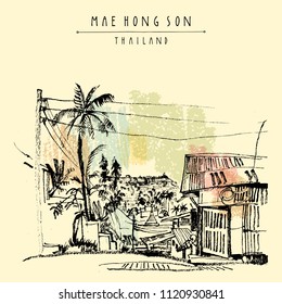 Maehongson, Thailand, Southeast Asia. City center. Traditional Northern Thai wooden house, palm trees, electric wires. Travel sketch. Vintage artistic postcard, poster, book illustration in vector