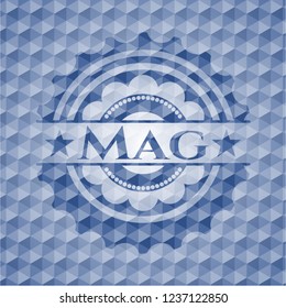 Mag blue emblem or badge with geometric pattern background.