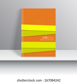 Magazine Cover with overlapping shapes and triangles. 