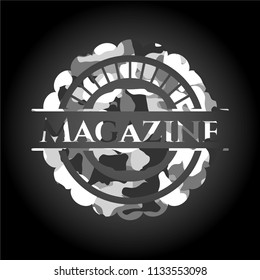 Magazine on grey camouflage pattern