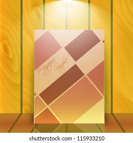 Magazine sample over realistic wooden wall