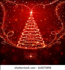 Árbol de Navidad mágico con copos de nieve