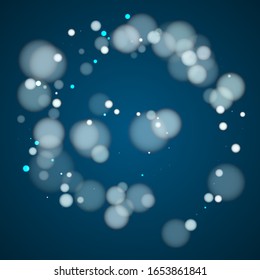 Magic circle bokeh lights texture backdrop. White abstract snowflakes over dark blue background. Blurred bokeh lights flare effect circle random dust party card pattern