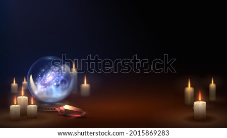 Magic crystal ball with candles and red crystal, witch items