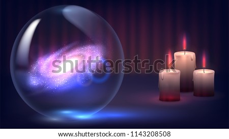 Magic crystal ball of divination and candles. Psychic, fortune telling