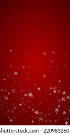 Magic falling snow christmas background. Subtle flying snow flakes and stars on christmas red background. Magic falling snow holiday scenery.   Vertical vector illustration.