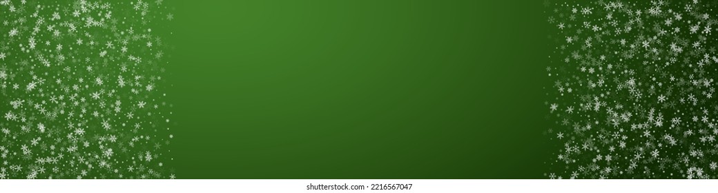 Magic falling snow christmas background. Subtle flying snow flakes and stars on christmas green background. Magic falling snow holiday scenery.   Panoramic vector illustration.