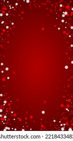 Magic falling snow christmas background. Subtle flying snow flakes and stars on christmas red background. Magic falling snow holiday scenery.   Vertical vector illustration.