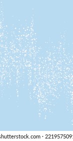 Magic falling snow christmas background. Subtle flying snow flakes and stars on light blue winter backdrop. Magic falling snow holiday scenery.   Vertical vector illustration.
