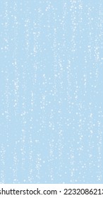Magic falling snow christmas background. Subtle flying snow flakes and stars on light blue winter backdrop. Magic falling snow holiday scenery.   Vertical vector illustration.