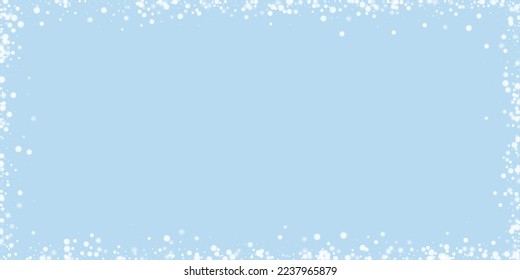Magic falling snow christmas background. Subtle flying snow flakes and stars on light blue winter backdrop. Magic falling snow holiday scenery.   Wide vector illustration.