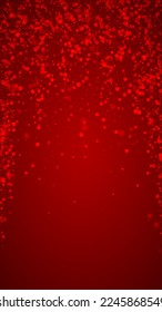 El fondo de navidad de la nieve cae mágicamente. Sutiles copos de nieve volando y estrellas de fondo rojo navideño. Escenario de vacaciones de nieve en caída mágica.   Ilustración vectorial vertical.