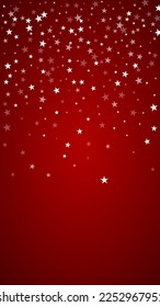 Magic falling snow christmas background. Subtle flying snow flakes and stars on christmas red background. Magic falling snow holiday scenery.   Vertical vector illustration.