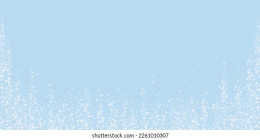 Magic falling snow christmas background. Subtle flying snow flakes and stars on light blue winter backdrop. Magic falling snow holiday scenery.   Wide vector illustration.