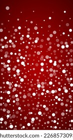 Magic falling snow christmas background. Subtle flying snow flakes and stars on christmas red background. Magic falling snow holiday scenery.   Vertical vector illustration.