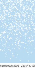 Magic falling snow christmas background. Subtle flying snow flakes and stars on light blue winter backdrop. Magic falling snow holiday scenery.   Vertical vector illustration.
