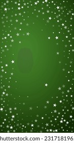 Magic falling snow christmas background. Subtle flying snow flakes and stars on christmas green background. Magic falling snow holiday scenery.   Vertical vector illustration.