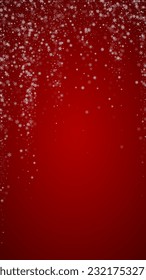 Magic falling snow christmas background. Subtle flying snow flakes and stars on christmas red background. Magic falling snow holiday scenery.   Vertical vector illustration.
