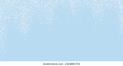 Magic falling snow christmas background. Subtle flying snow flakes and stars on light blue winter backdrop. Magic falling snow holiday scenery.   Wide vector illustration.