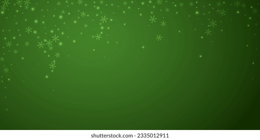 Magic falling snow christmas background. Subtle flying snow flakes and stars on christmas green background. Magic falling snow holiday scenery.   Wide vector illustration.