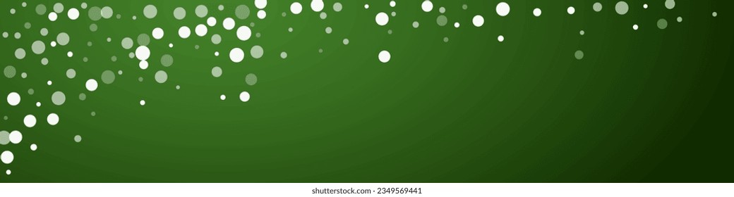 Magic falling snow christmas background. Subtle flying snow flakes and stars on christmas green background. Magic falling snow holiday scenery.   Panoramic vector illustration.