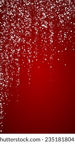 Magic falling snow christmas background. Subtle flying snow flakes and stars on christmas red background. Magic falling snow holiday scenery.   Vertical vector illustration.