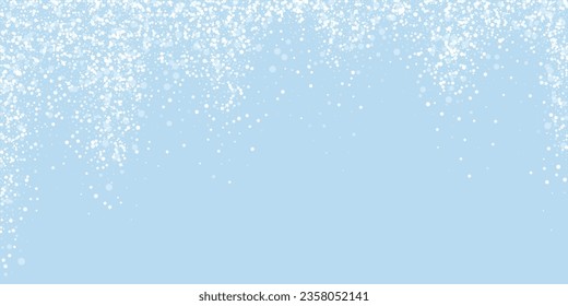 Magic falling snow christmas background. Subtle flying snow flakes and stars on light blue winter backdrop. Magic falling snow holiday scenery.   Wide vector illustration.